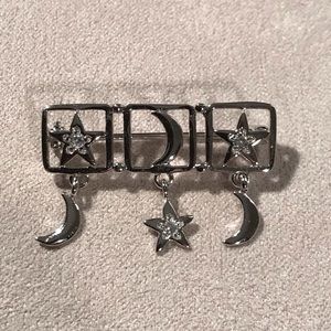 Three  1/4 moons, three stars,not in a row.